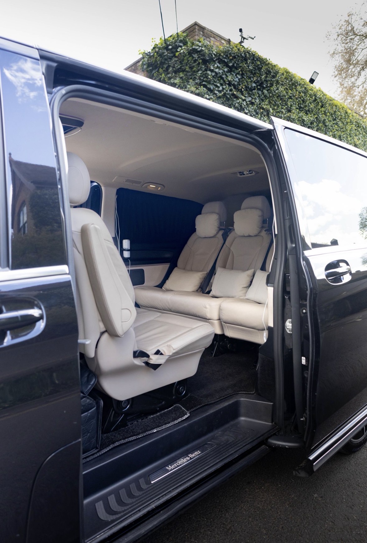 Cream leather passenger seats inside a Mercedes-Benz V-Class